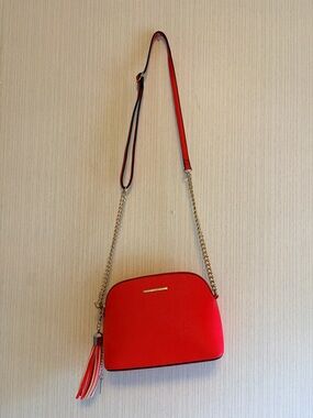 Aldo Red Crossbody Bag with Tassel and Gold Chain